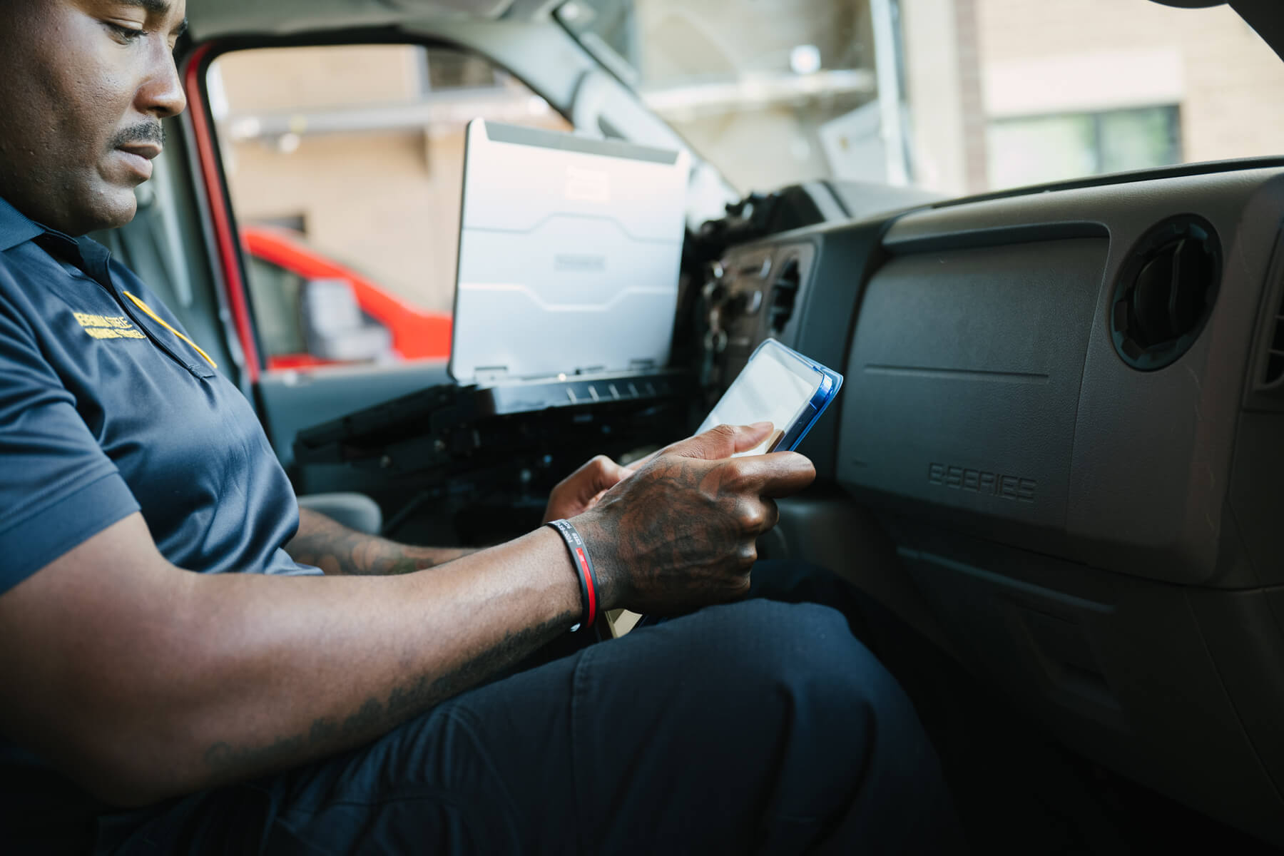 Paramedic using HealthEMS iPad